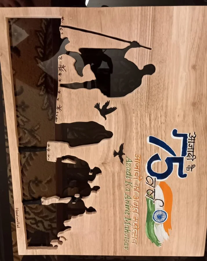 Commemorative panel in progress, cut in solid wood