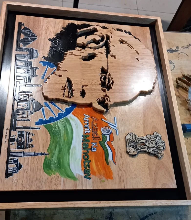 Layered commemorative panel with hand-painted flag and emblem