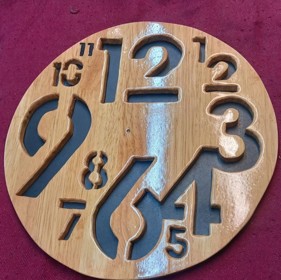 Wall clock with oversized cut wooden numerals