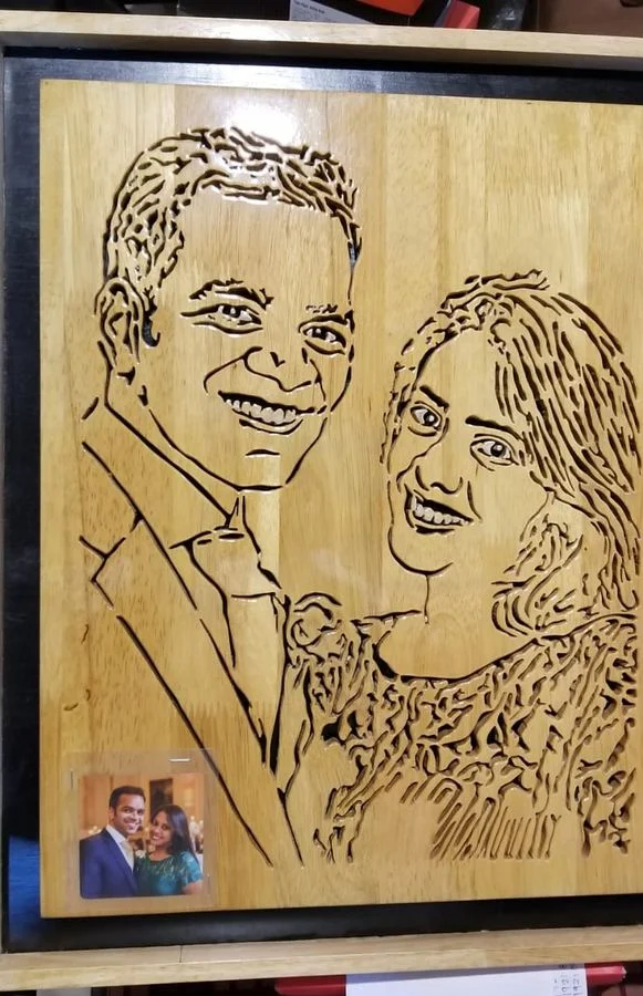 Couple portrait in progress with the reference photograph attached