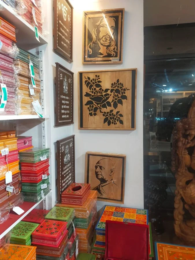 Wood panels displayed on a shelved retail wall