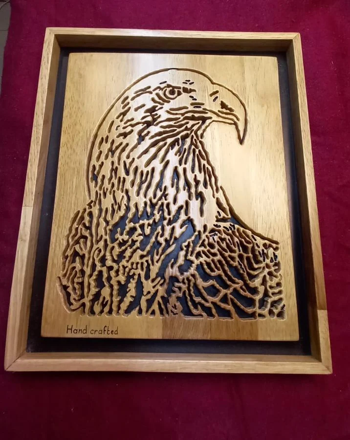 Eagle panel hand-cut in wood, marked Hand crafted