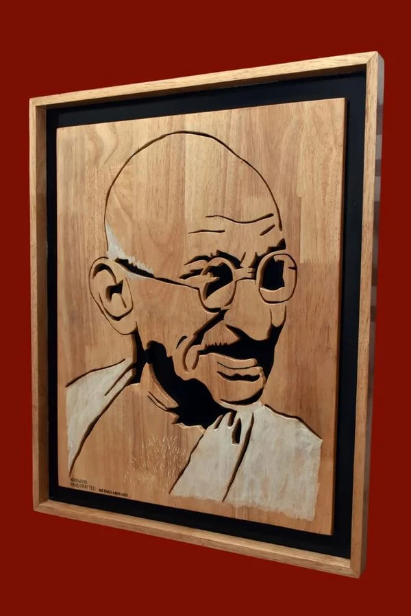 Scroll saw portrait of Mahatma Gandhi with a deep shadow-box frame