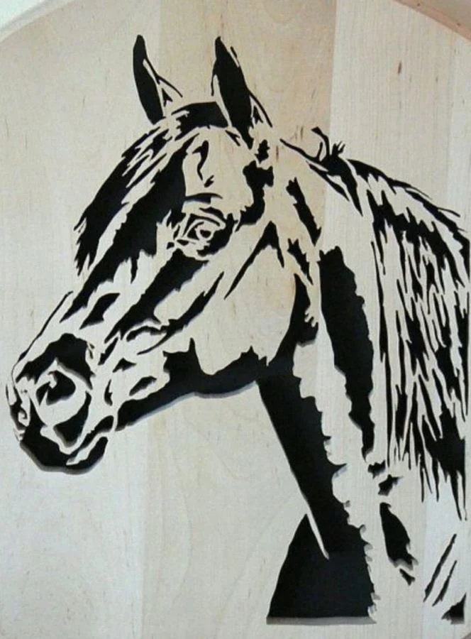 Horse head panel with strong black and wood contrast