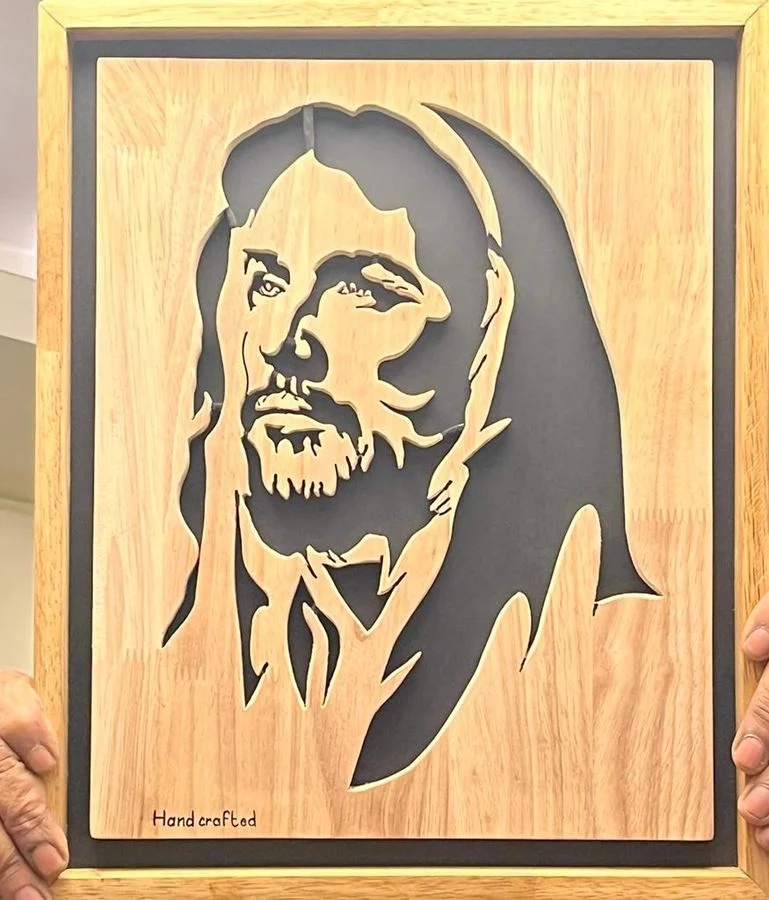 Veiled portrait of Christ cut in solid wood