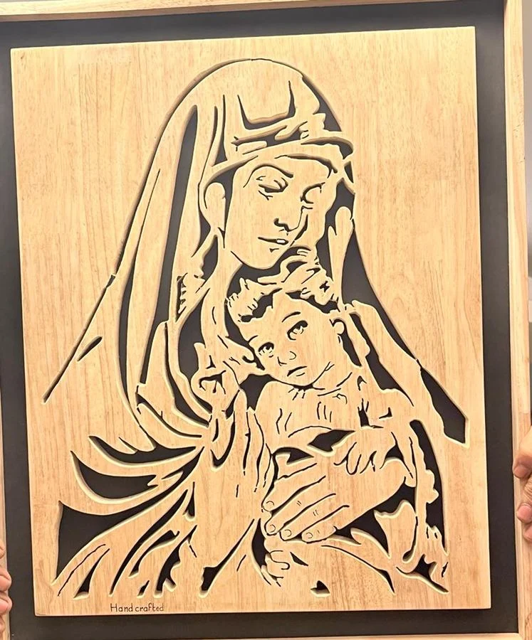 Madonna and Child hand-cut in wood, marked Handcrafted