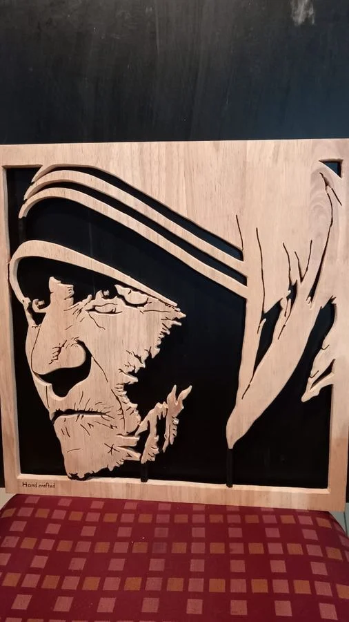 Mother Teresa portrait hand-cut in wood