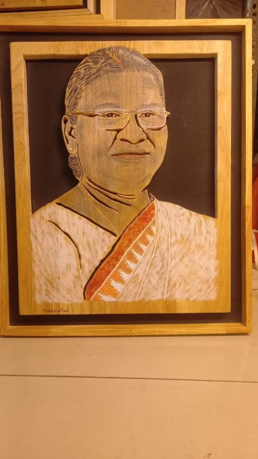 Hand-coloured wood portrait in a wooden frame
