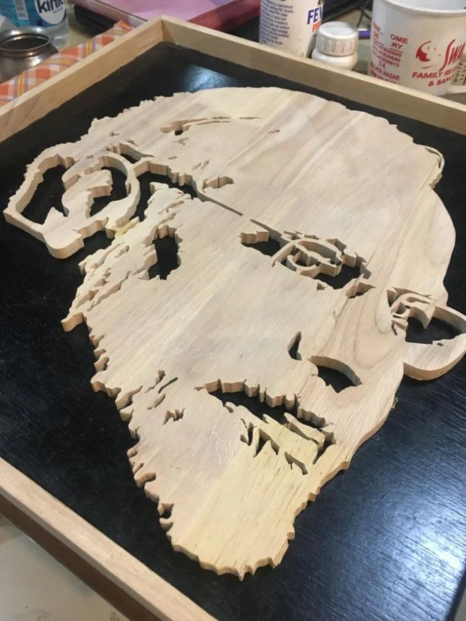 A rough-cut panel before edges are rounded and sanded
