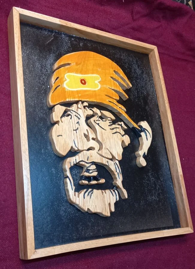 Layered Sai Baba panel with hand-painted colour and raised relief