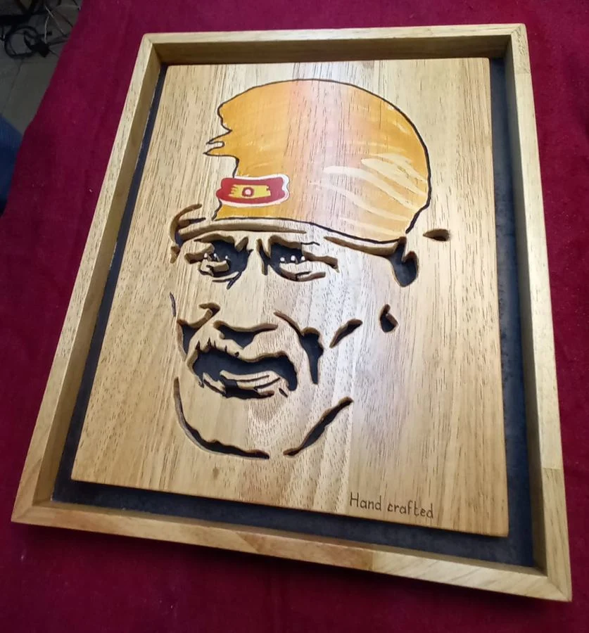 Hand-painted Sai Baba portrait on a solid wood panel