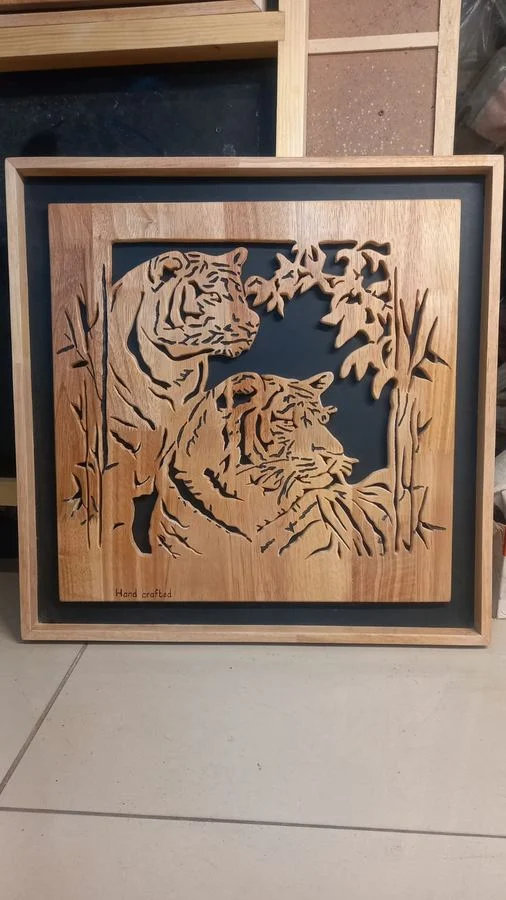 Tiger among bamboo, cut as a framed wood panel