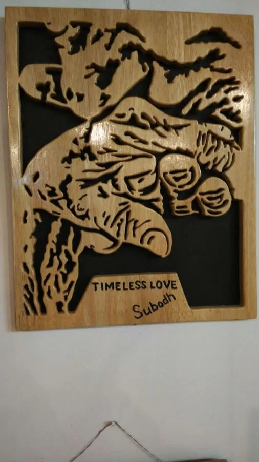 Panel titled Timeless Love, signed Subodh